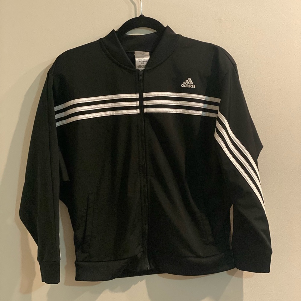 Adidas Girls zip up track jacket. Great condition. Size XL (16)
